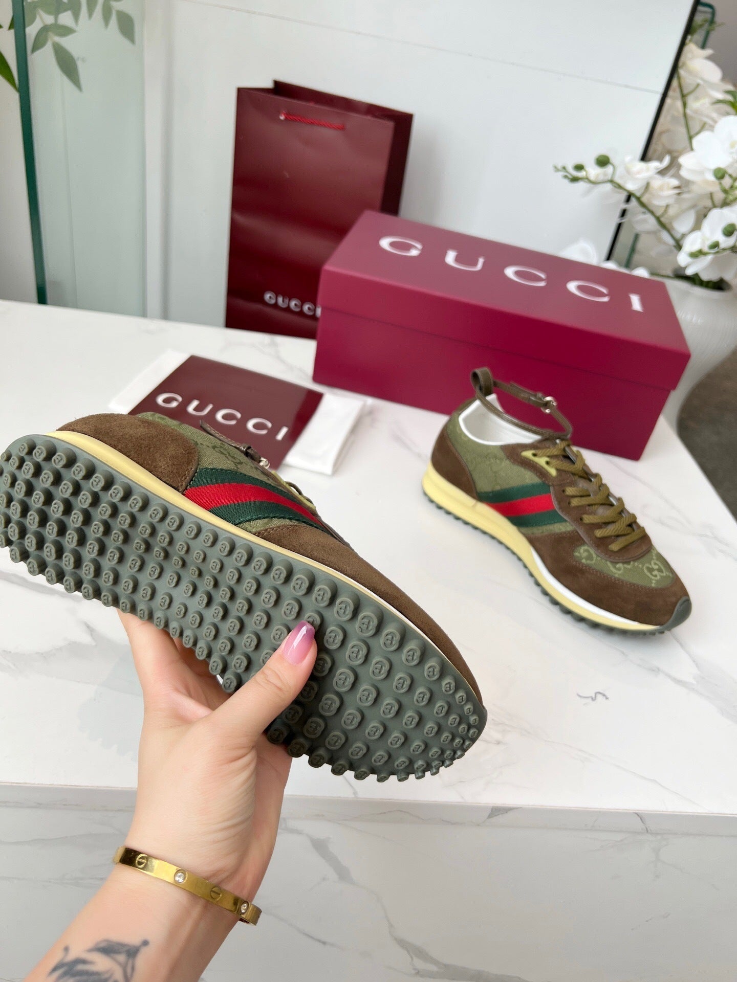 GUCCI RE-MOTION